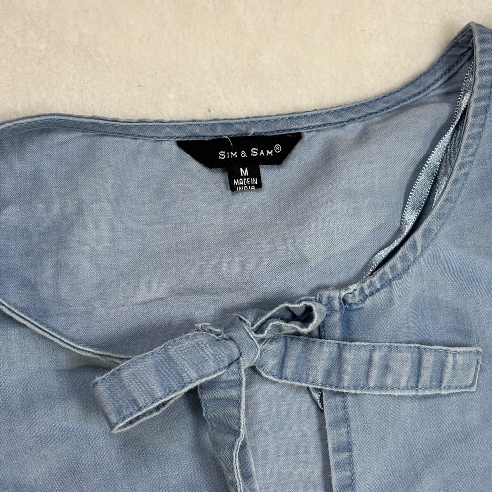 Sim & Sam women’s size M blouse with puff sleeves,front tie bows, and peplum hem - Picture 5 of 7